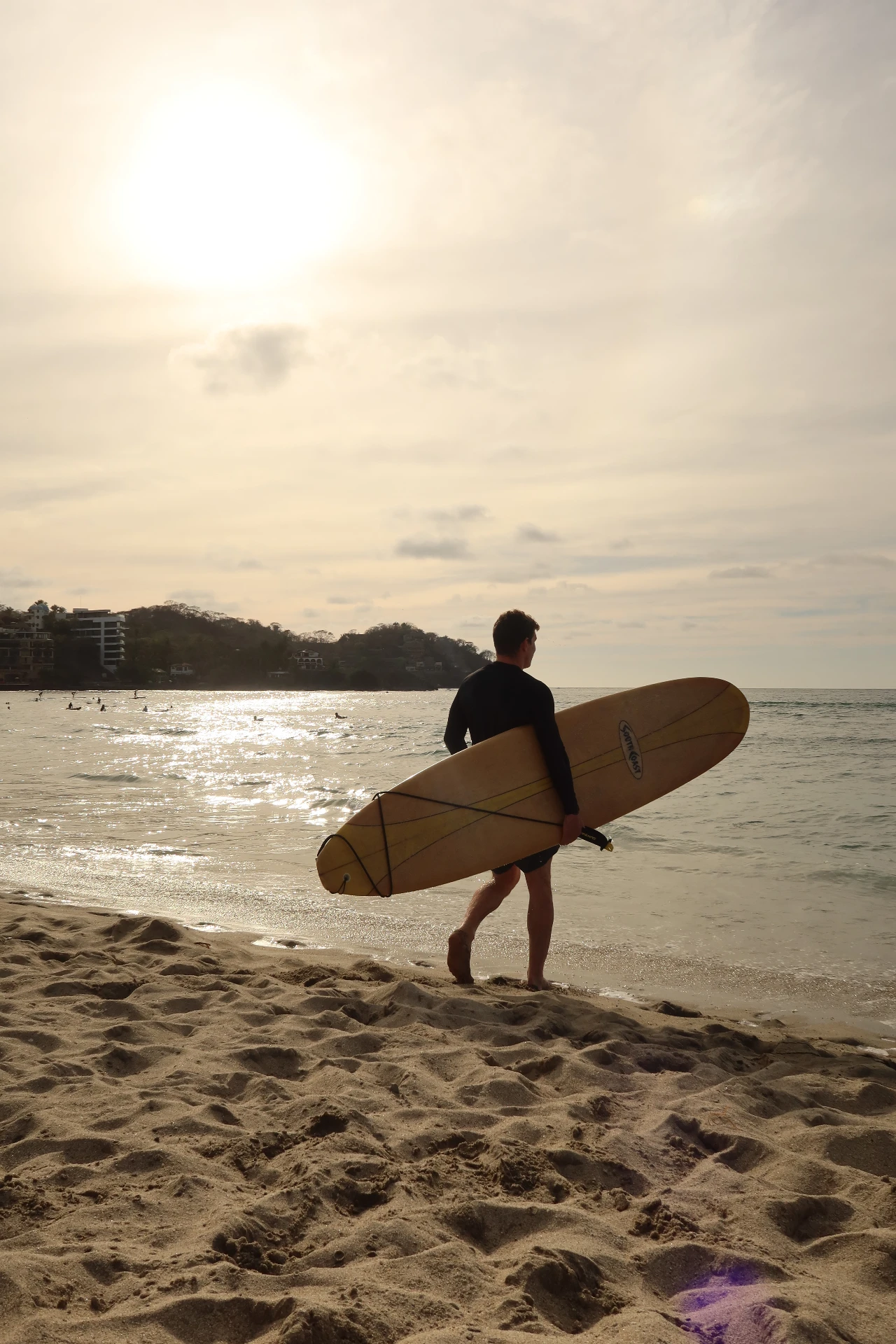 Valentin surfing at sunset